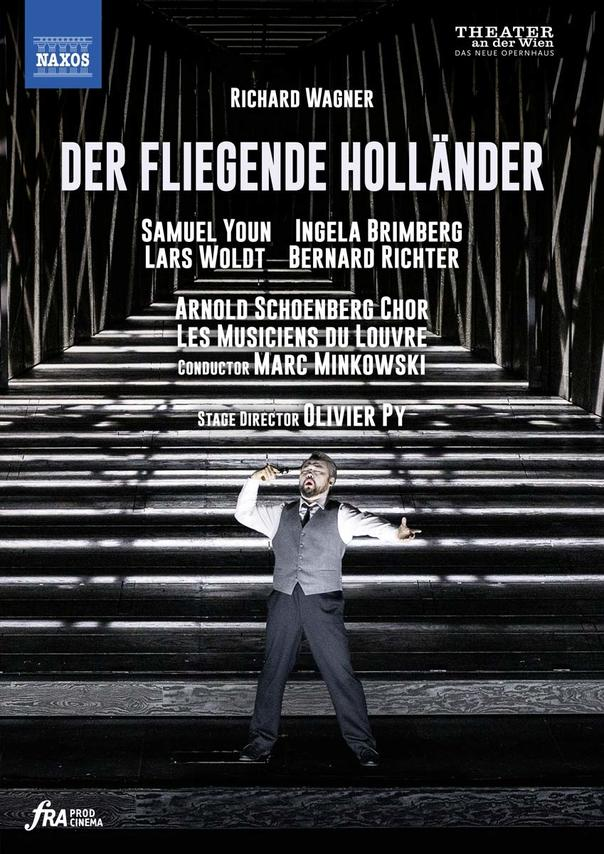Opernplakat: 'Der Fliegende Holländer' mit einem Mann im Anzug auf einer Bühne.
