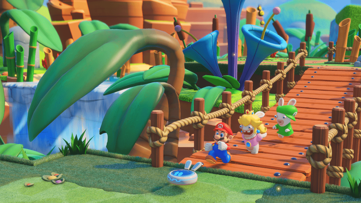 Mario- und Rabbids-Charaktere auf einer Brücke in einer farbenfrohen Videospielszen.