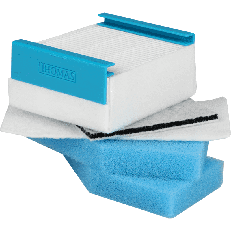 Ein blaues und schwarzes Gerät mit dem Wort 'THOMAS' an der Seite, das auf blauem Schaumstoff ruht.