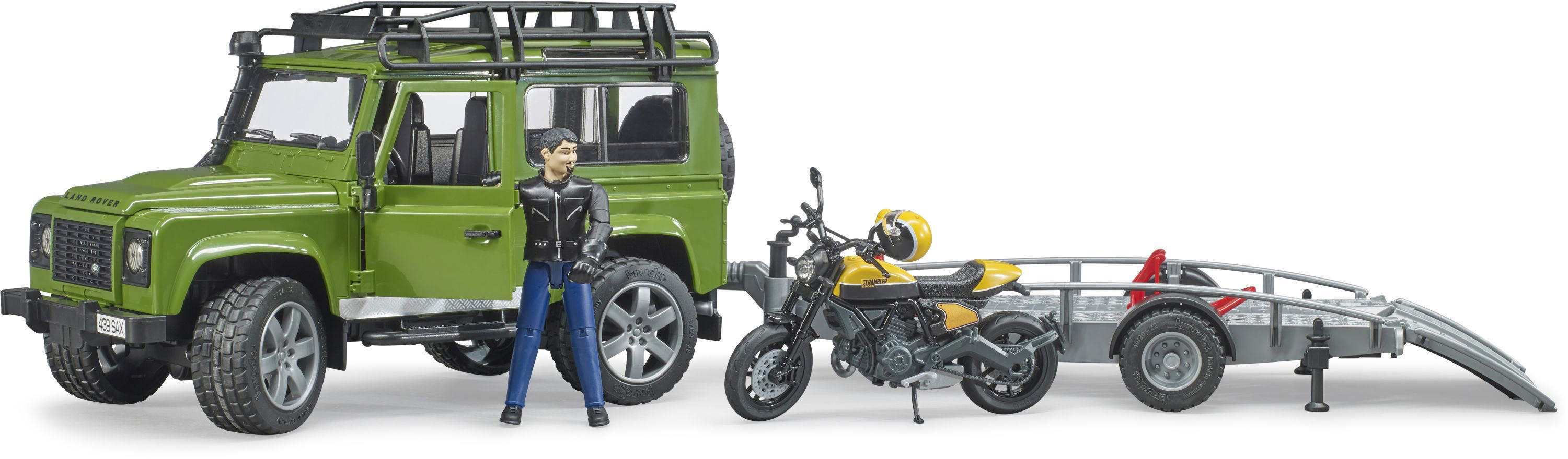 Grüner Land Rover mit Person, gelbem Motorrad und Anhänger. Die Szene ist vor weißem Hintergrund.