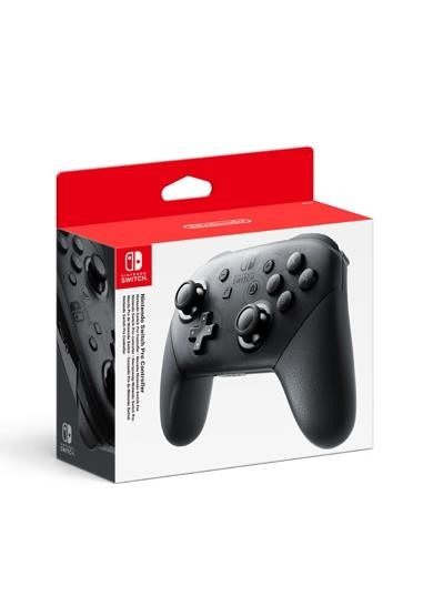 Een zwarte Nintendo Switch Pro Controller in een doos. De doos is rood en wit.