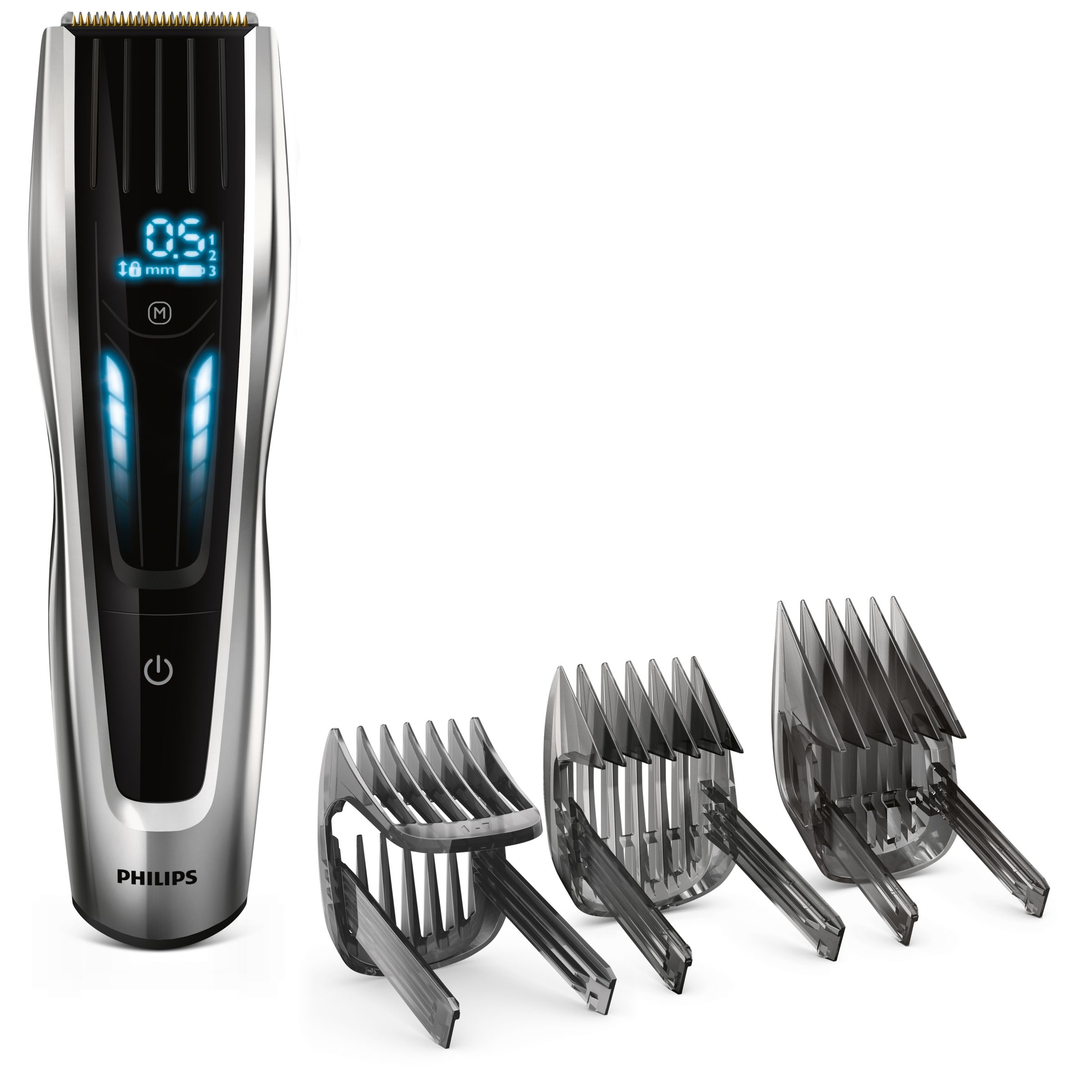 A silver and black Philips hair clipper with three comb attachments.