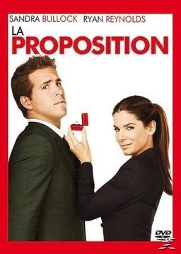 Affiche de film : Sandra Bullock et Ryan Reynolds. Elle tient une boîte à bagues, il regarde. Titre 'La Proposition'.