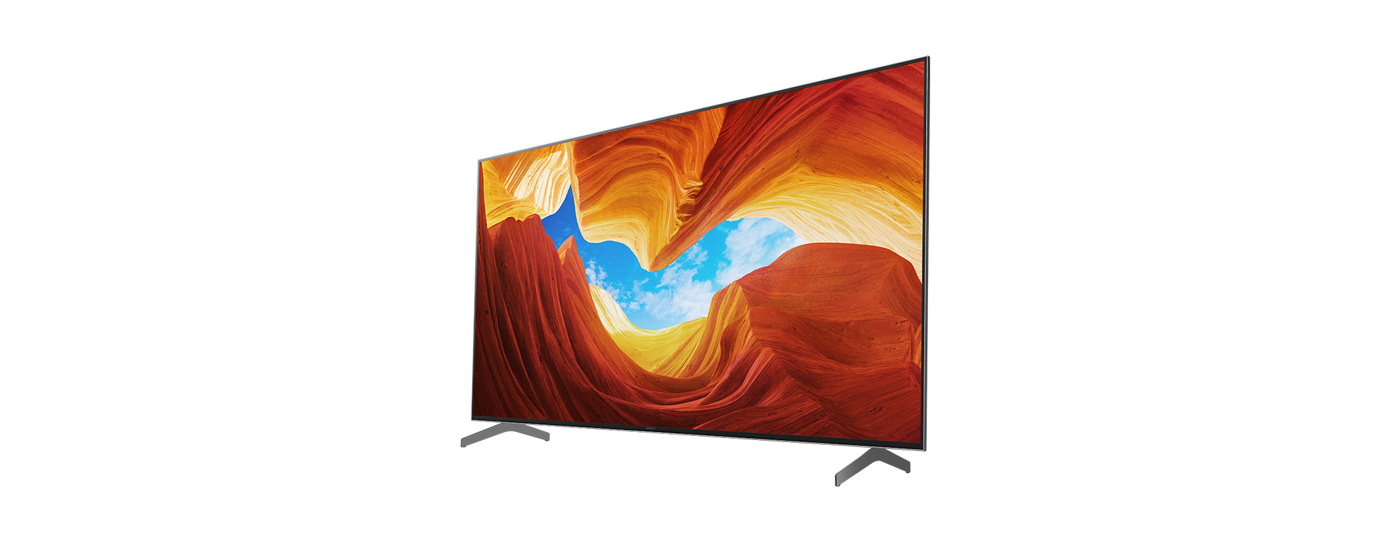 Ein Flachbildfernseher, der eine farbenfrohe Landschaft mit schwarzem Hintergrund zeigt.