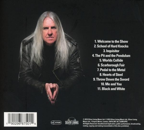 Albumcover mit einem Mann in Lederjacke und Trackliste.