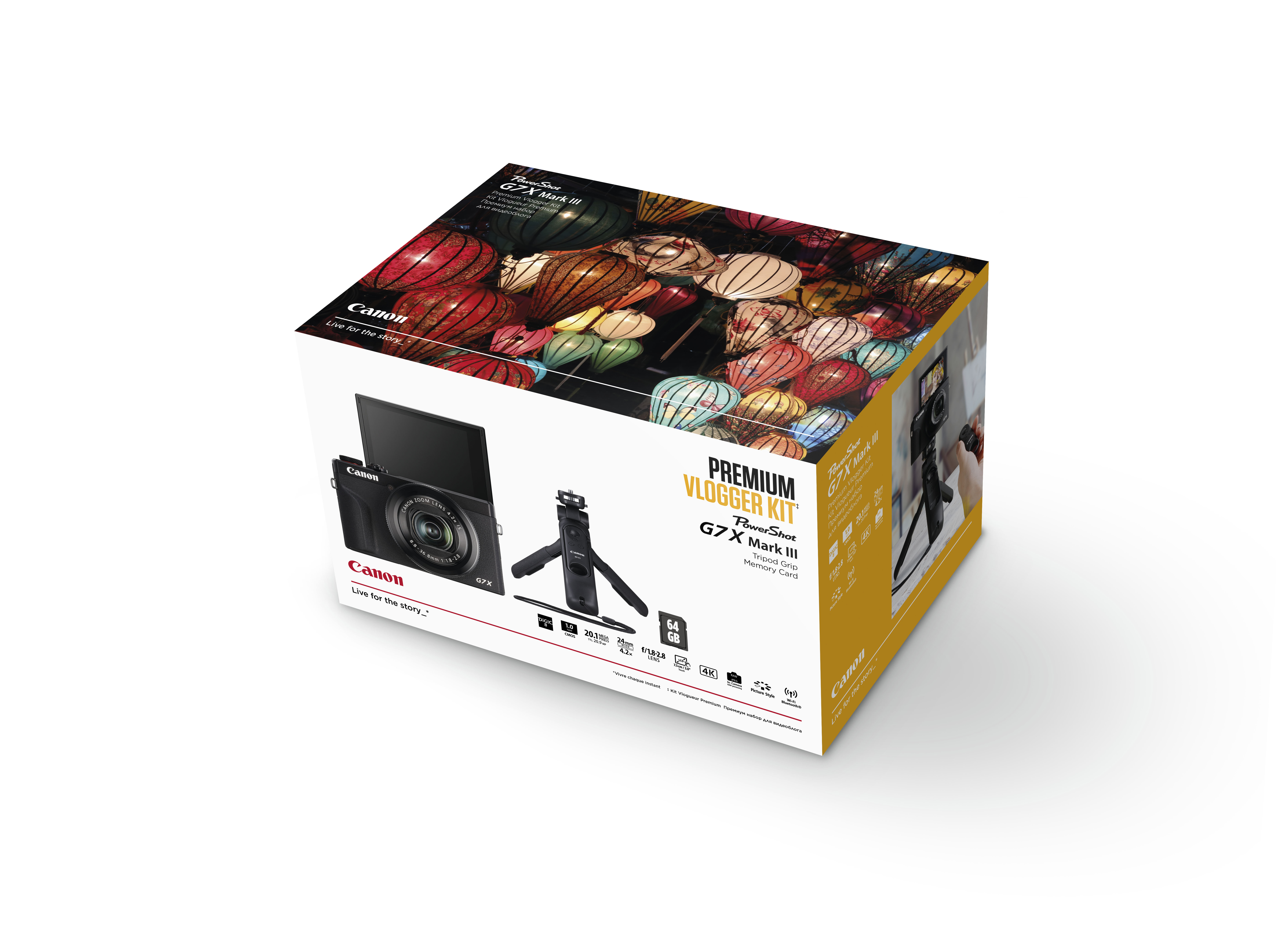 Canon camera box. The box shows a camera, a tripod, and a microphone with a city background.