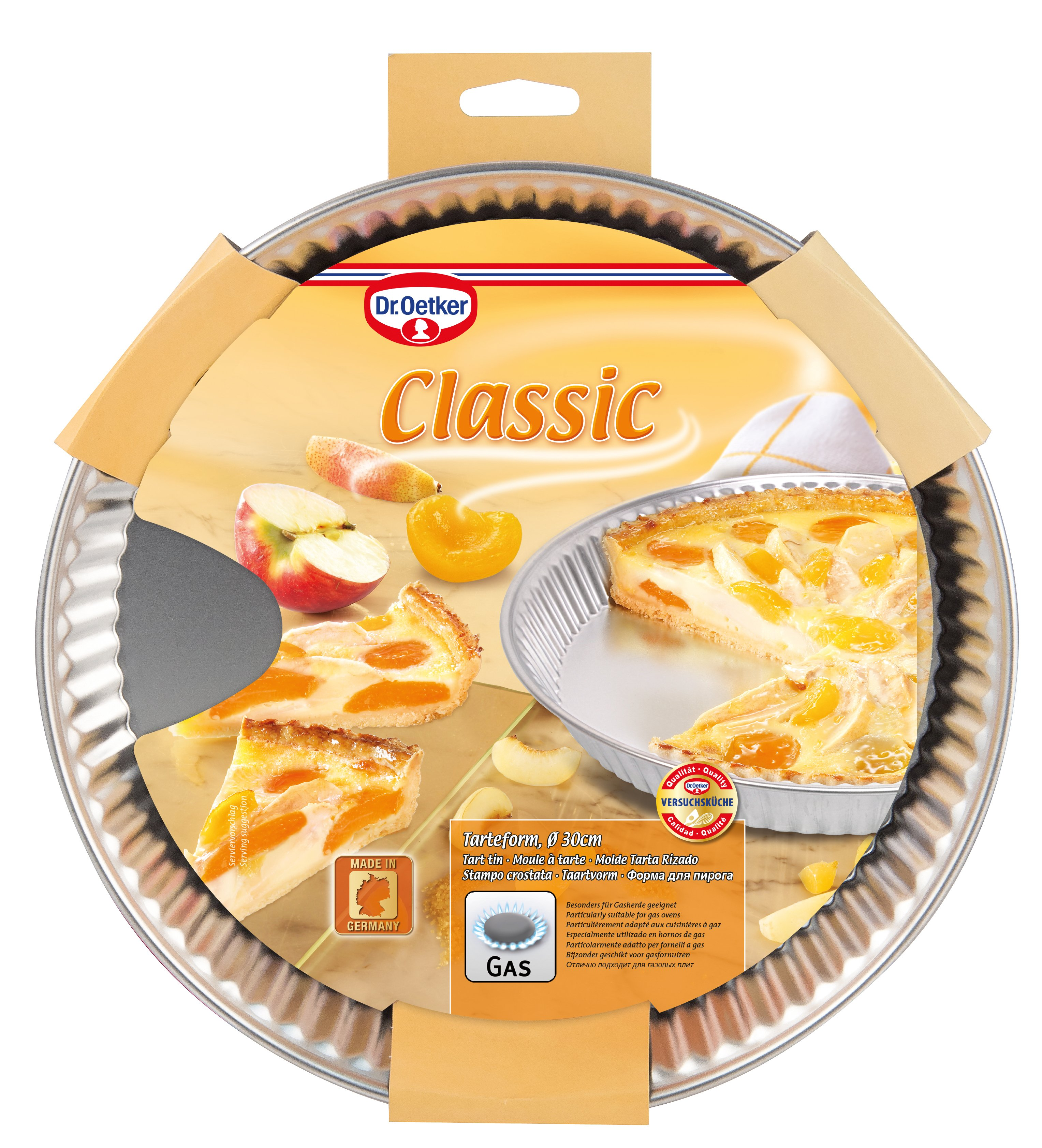 Das Bild zeigt eine Dr. Oetker Kuchenform mit einem Fruchttarte. Enthält Apfel- und Pfirsichscheiben.