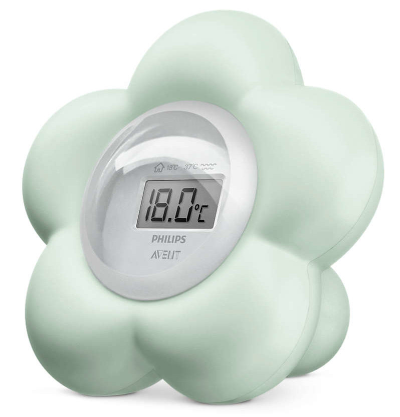 Een bloemvormige, mintgroene babytemperatuurmeter toont 18,0°C.