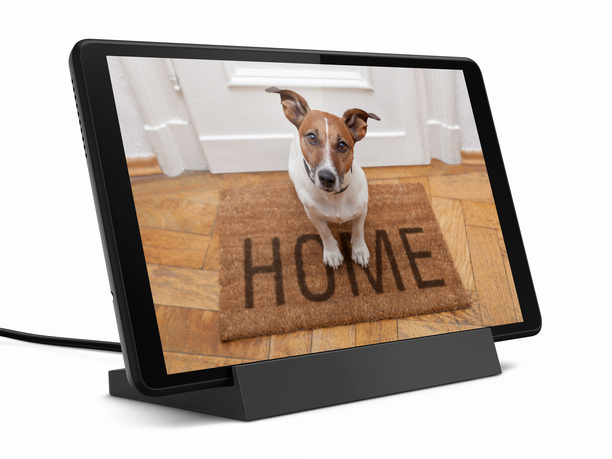 Tablet, das einen Hund auf einer Fußmatte mit dem Wort HOME anzeigt.