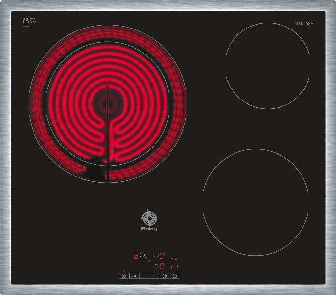 Una placa de cocina negra con tres elementos calefactores. Un elemento es rojo y circular.