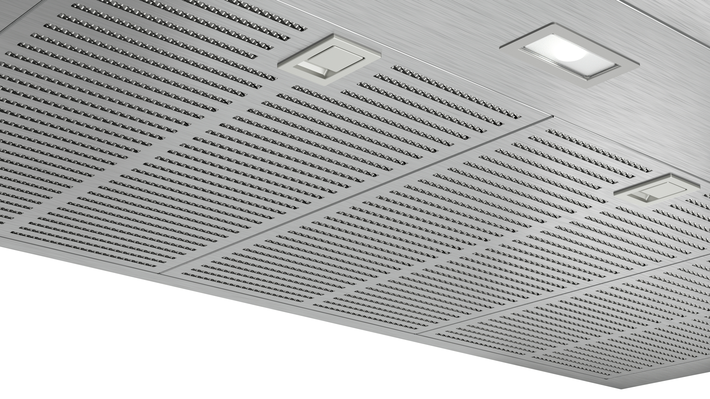Primer plano de una campana de cocina plateada. Superficie metálica perforada con luces y paneles de acceso rectangulares.