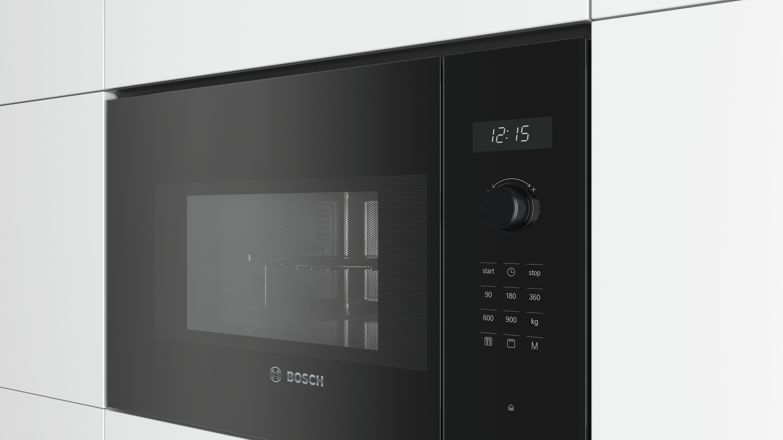Un horno microondas Bosch negro integrado en un armario blanco.