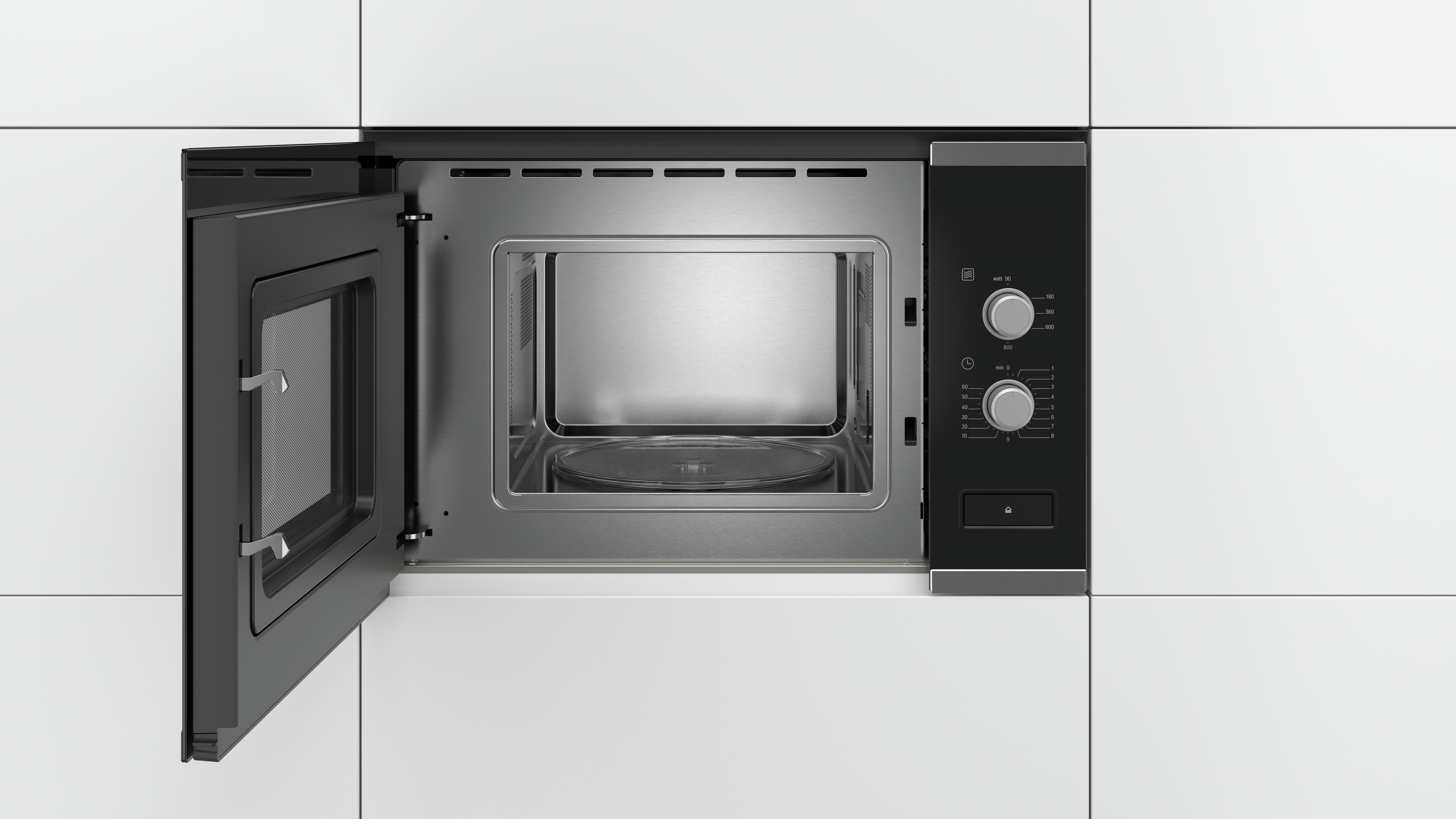 Horno microondas con puerta abierta, interior y panel de control.