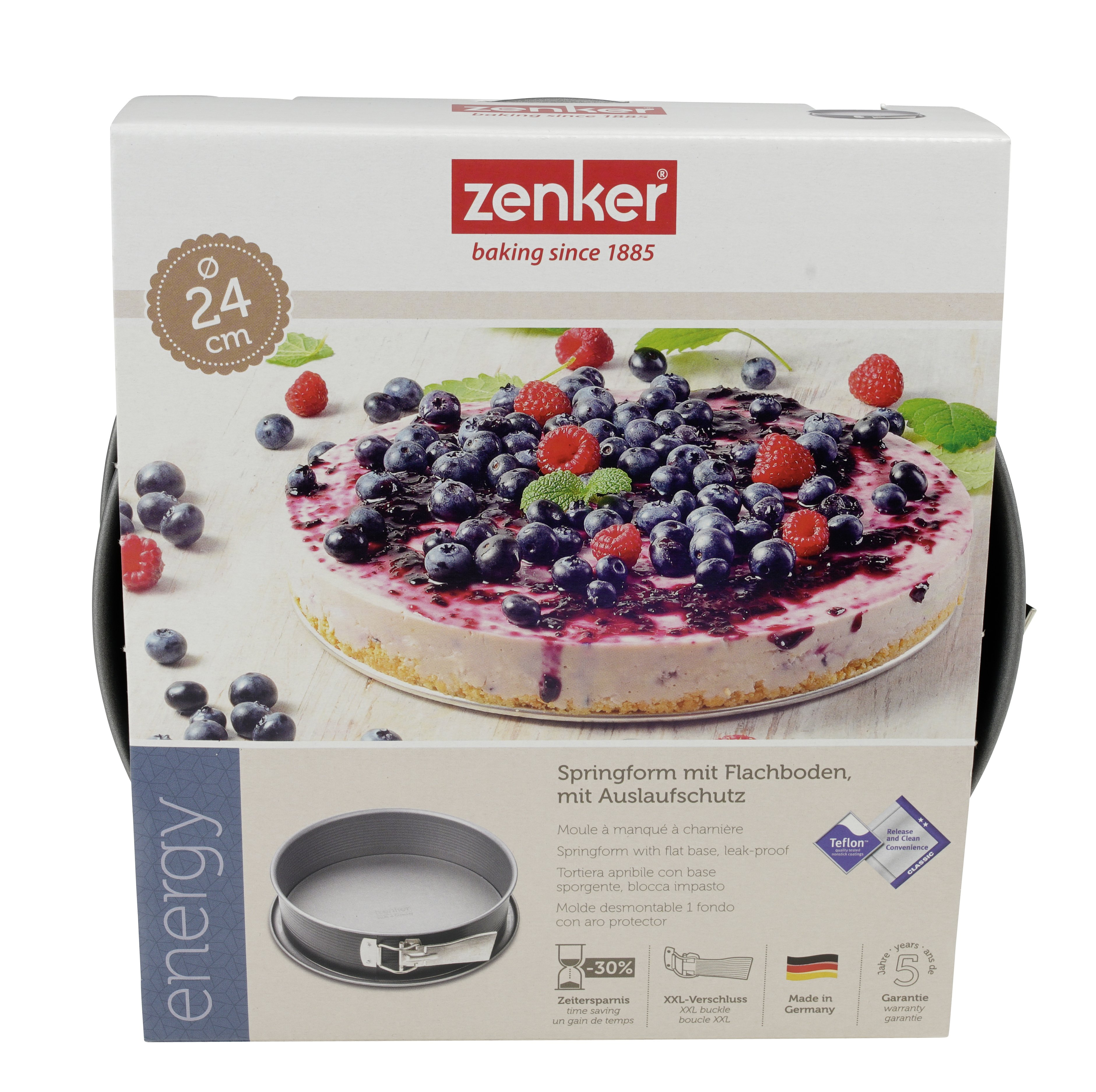 Käsekuchen mit Beeren in einer Springform, die Box zeigt das Produkt.