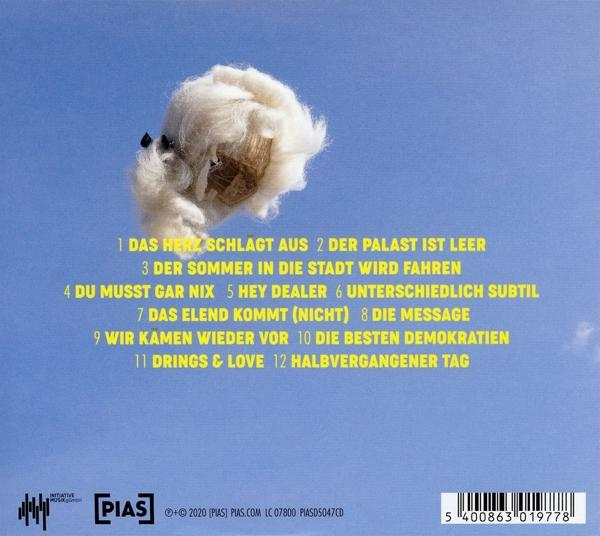 CD mit Liedtexten auf blauem Himmel Hintergrund.