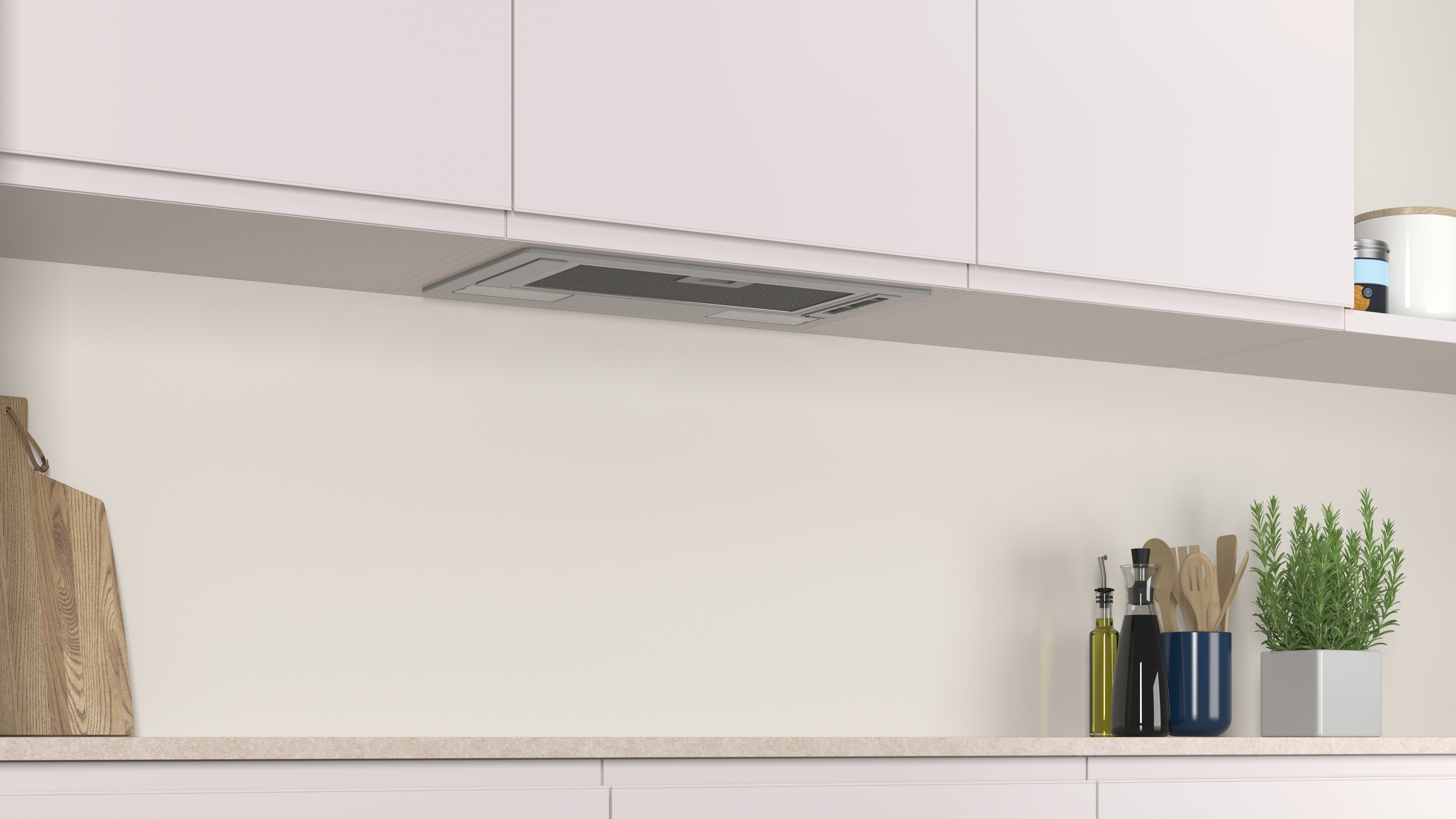 Una cocina con un armario blanco, campana extractora y plantas.