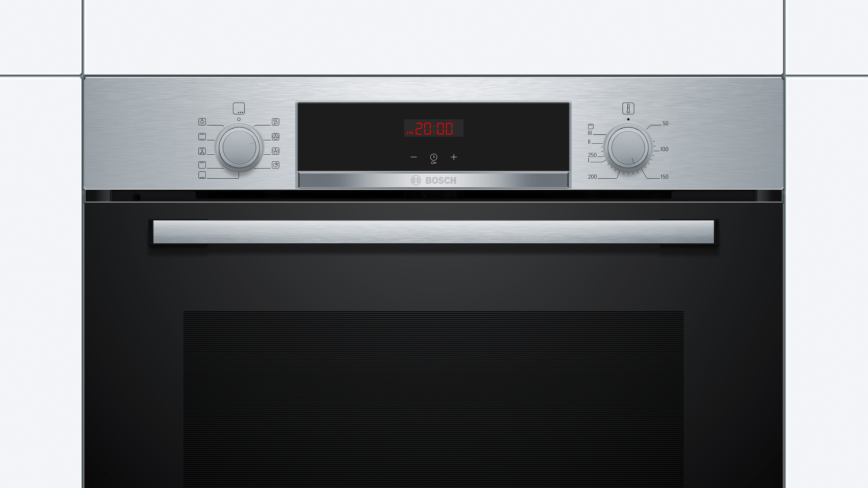 Un horno metálico con puerta negra y panel de control.