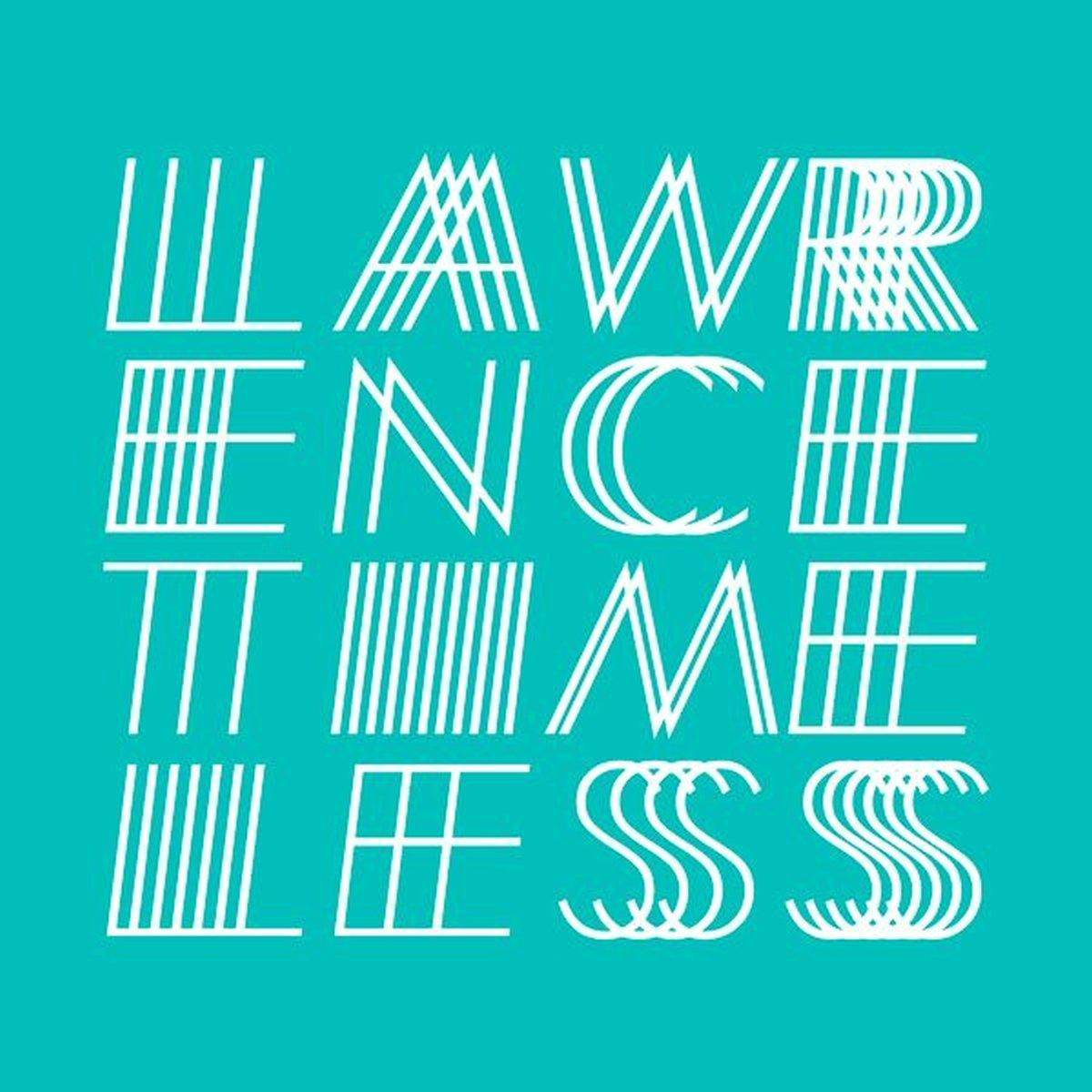 Albumcover: Weißer Text 'LAWRENCE', 'TIMELESS' auf türkisblauem Hintergrund.