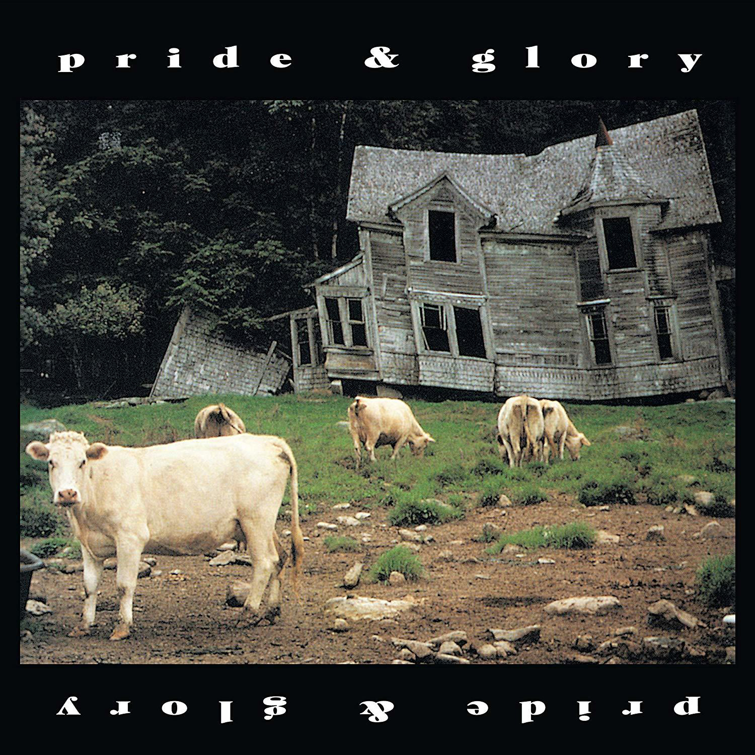 Ein altes Haus mit Kühen, die davor grasen. Der Titel Pride & Glory steht oben und unten.