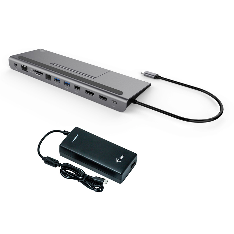 Ein grauer USB-C-Hub mit mehreren Anschlüssen und ein schwarzes Netzteil.