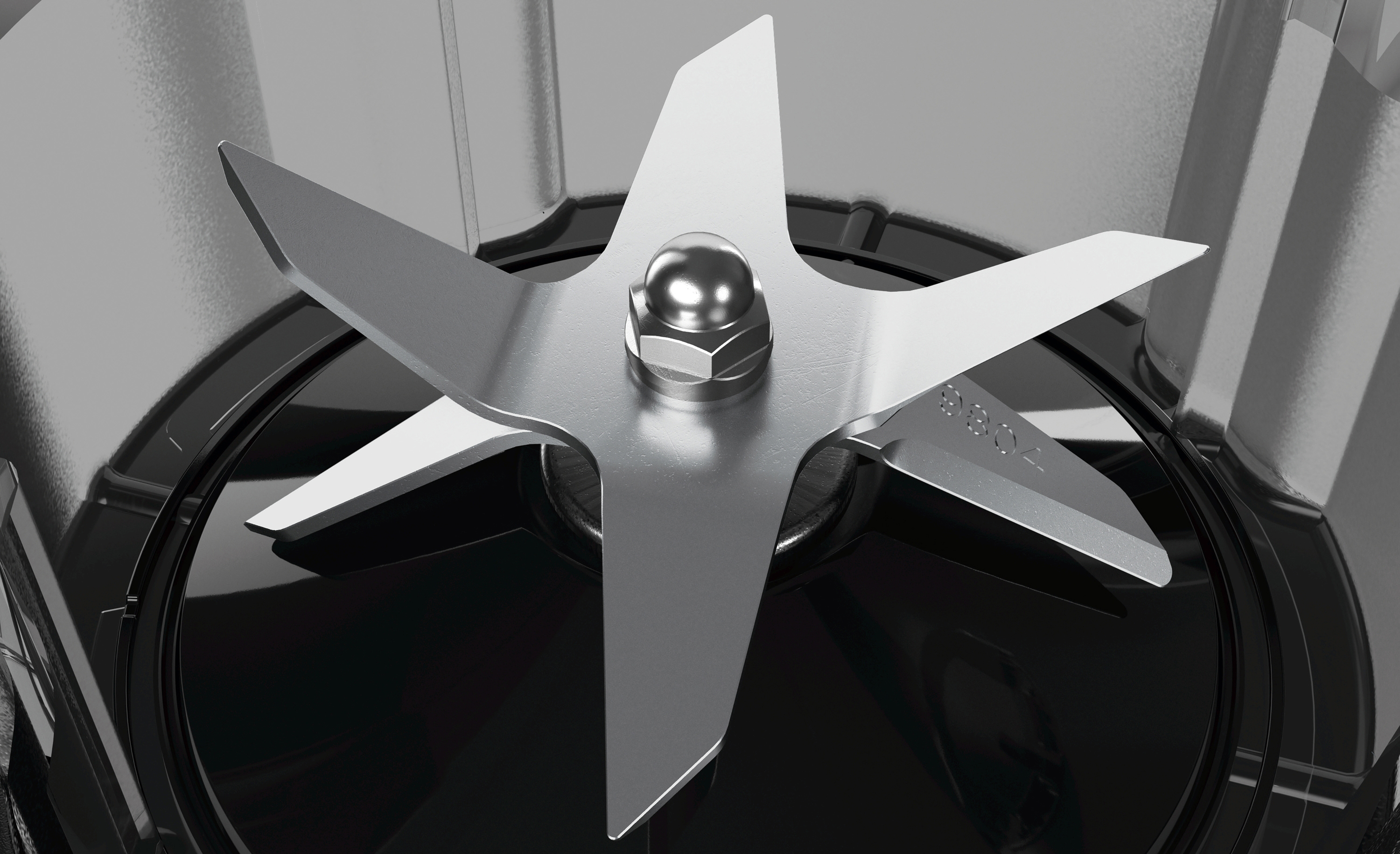 Ein schwarzer Handmixer mit Siemens-Markenlogo. Der Mixer befindet sich auf grau gefliestem Hintergrund.