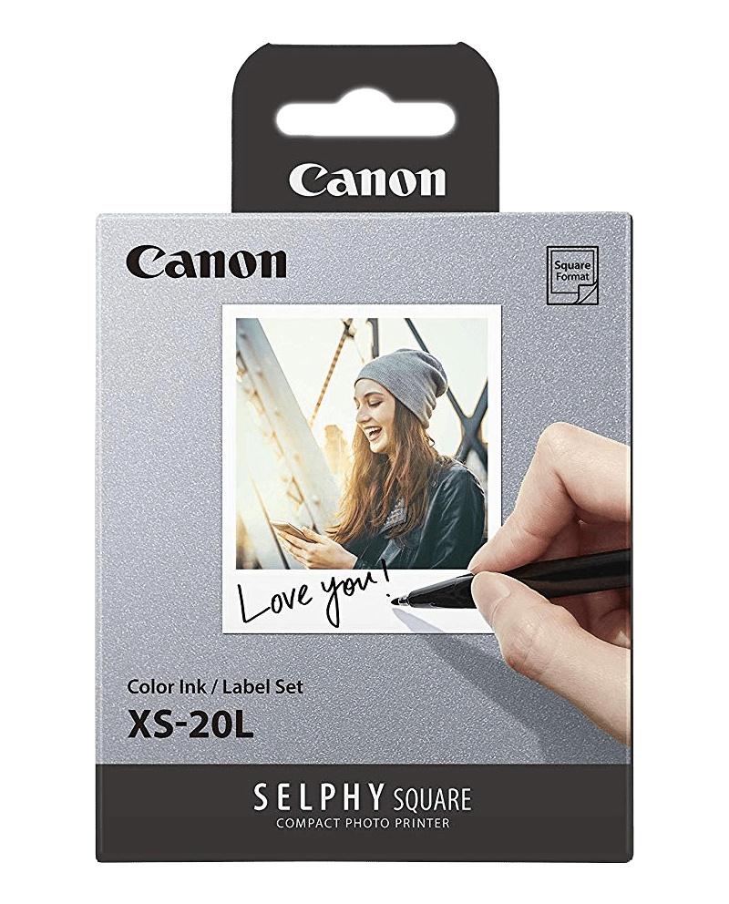 Boîte de papier photo Canon. Une photo est montrée avec une femme qui écrit dessus.