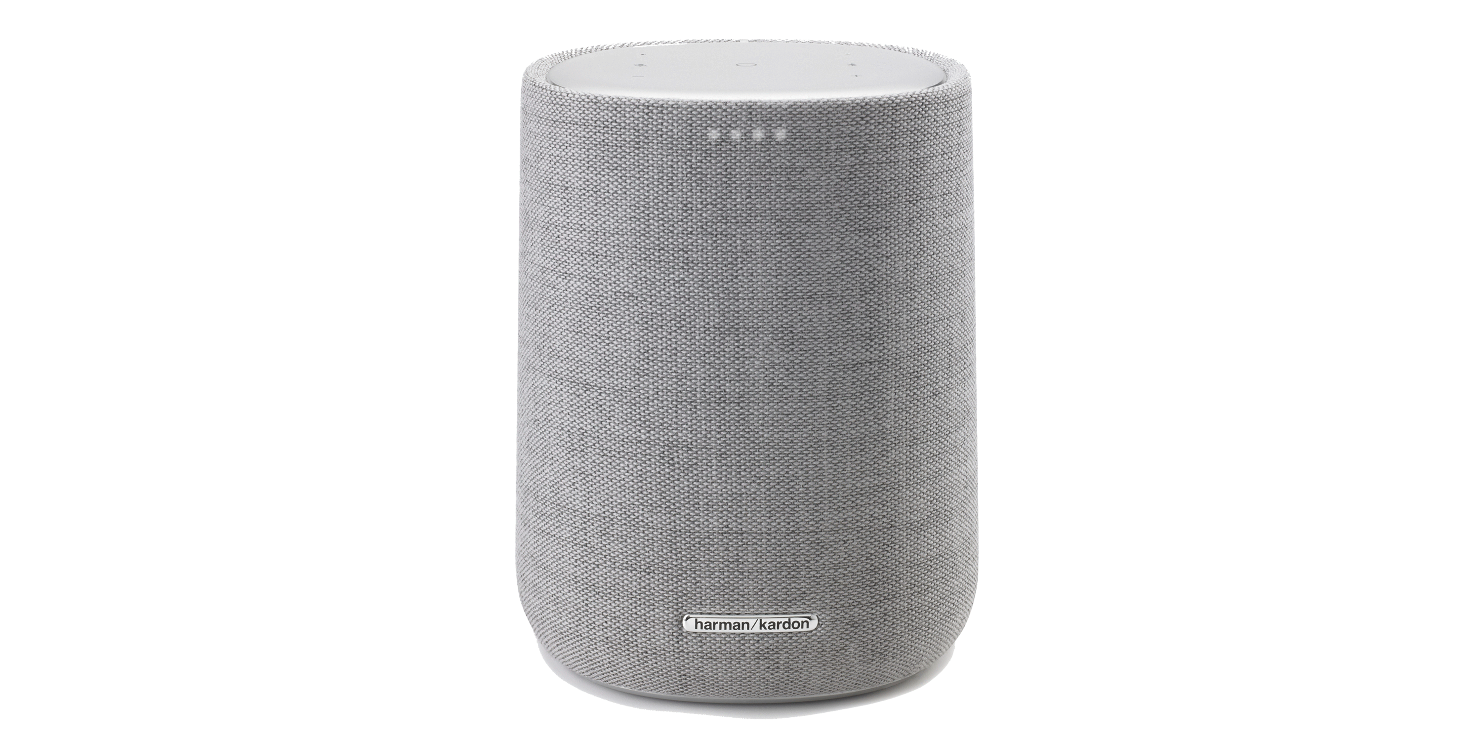Een cilindrische grijze luidspreker met het Harman Kardon logo. Zwarte achtergrond.