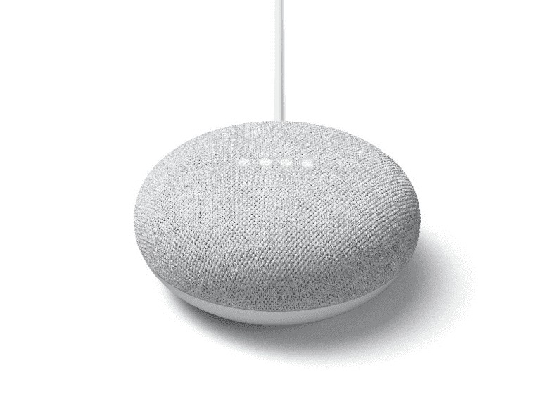 Dispositivo Google Nest Mini blanco sobre una superficie blanca.