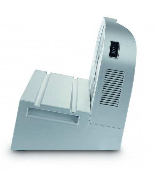 Appliance with a white base and a slanted, gray top with power switch.