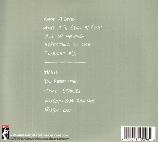 Dos de l'album. Fond vert avec texte manuscrit blanc et logo.