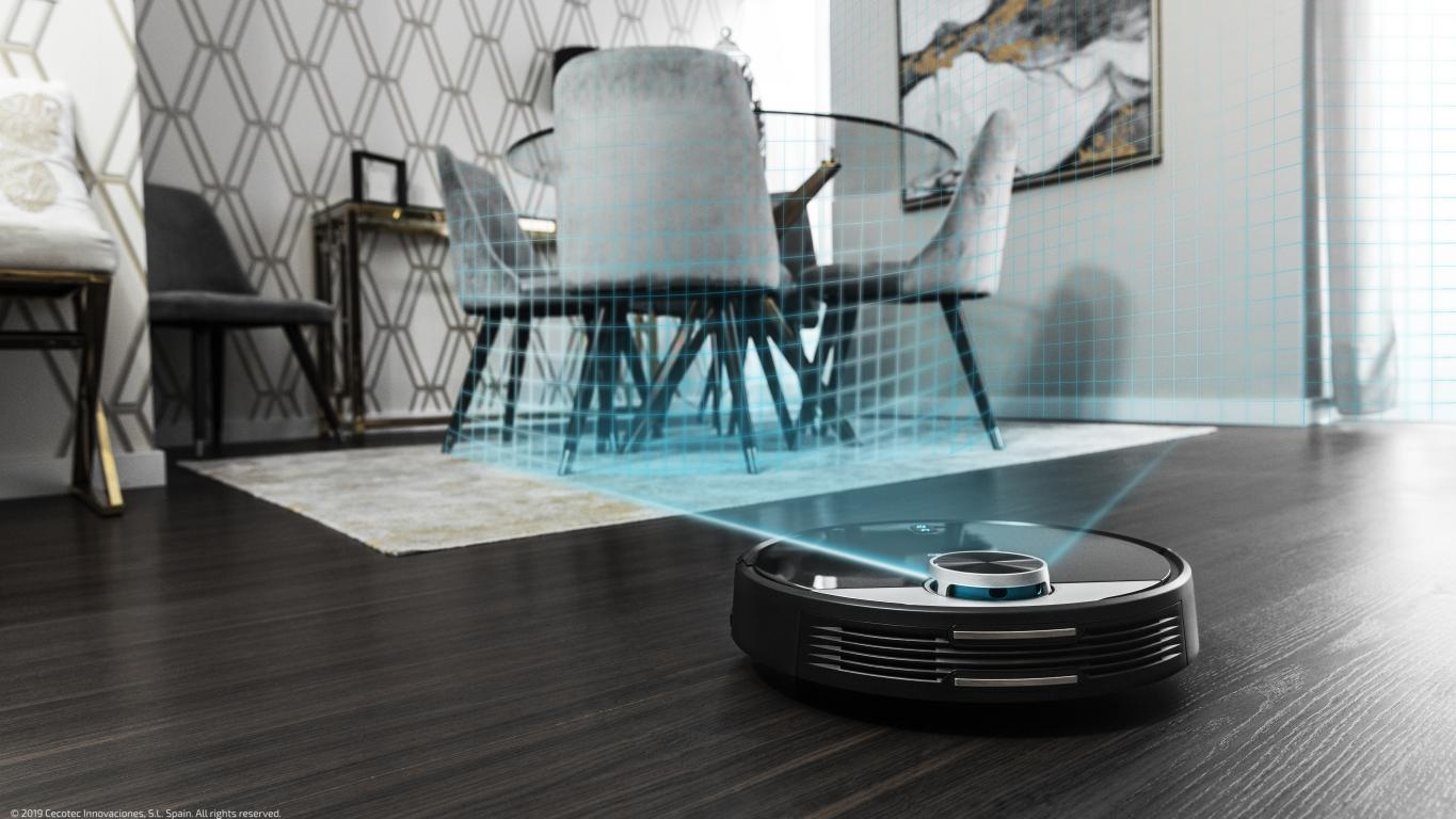 Una aspiradora robot en un piso de madera oscura con una superposición de cuadrícula azul claro.