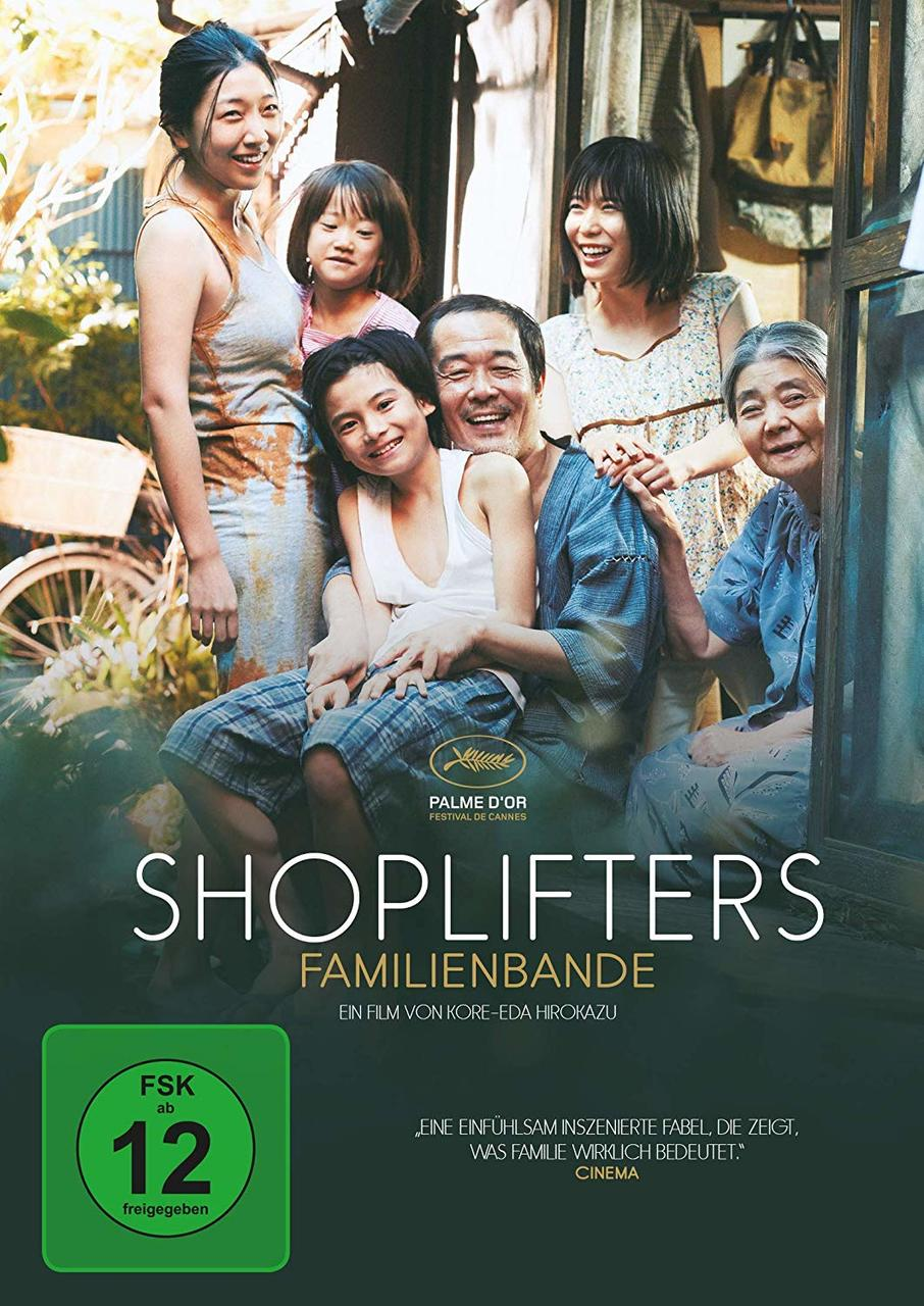 Filmposter mit Familienporträt, japanischer Text.