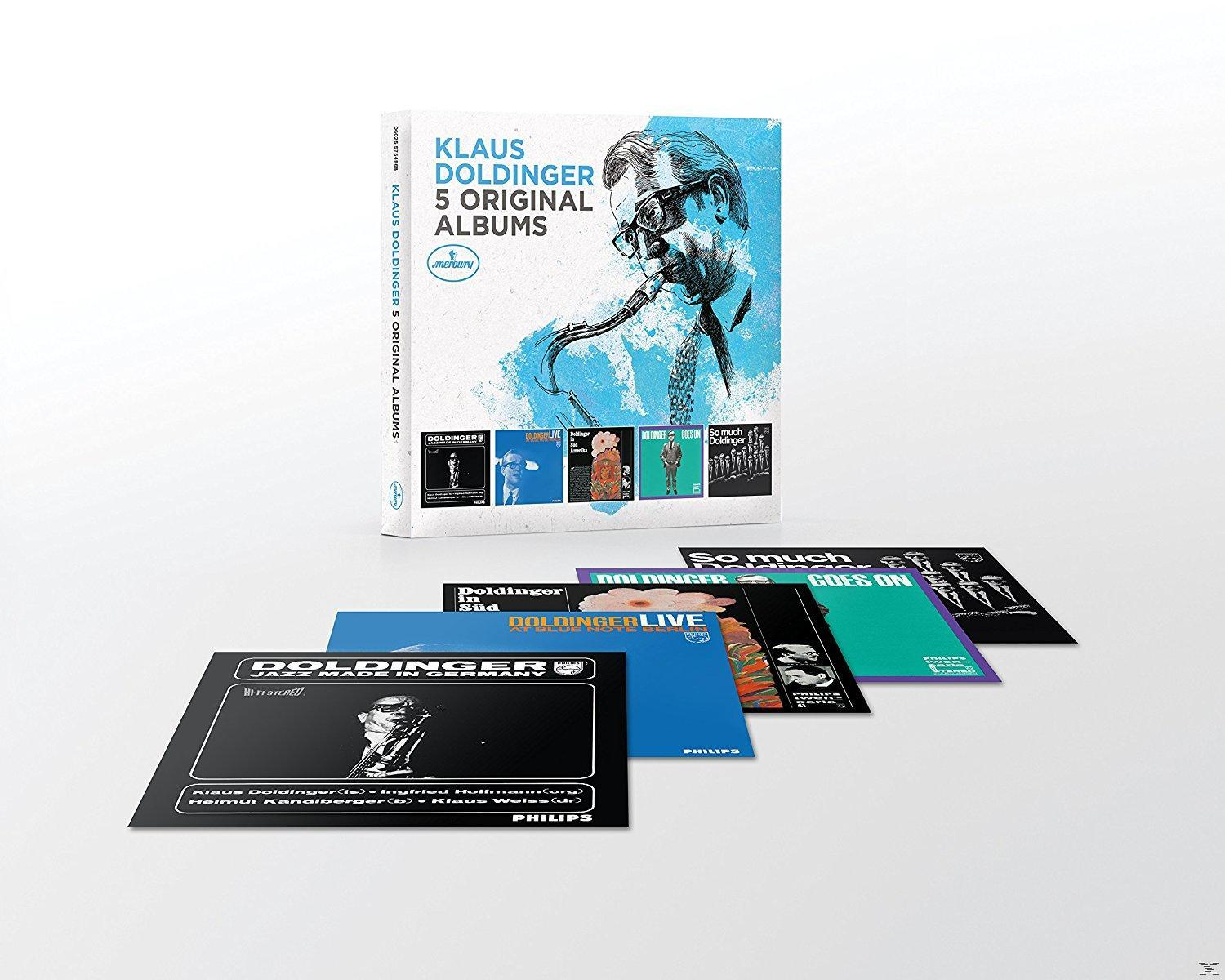 Eine Box mit Klaus Doldingers 5 Originalalben, mit Albumcovern und dem Foto des Künstlers.