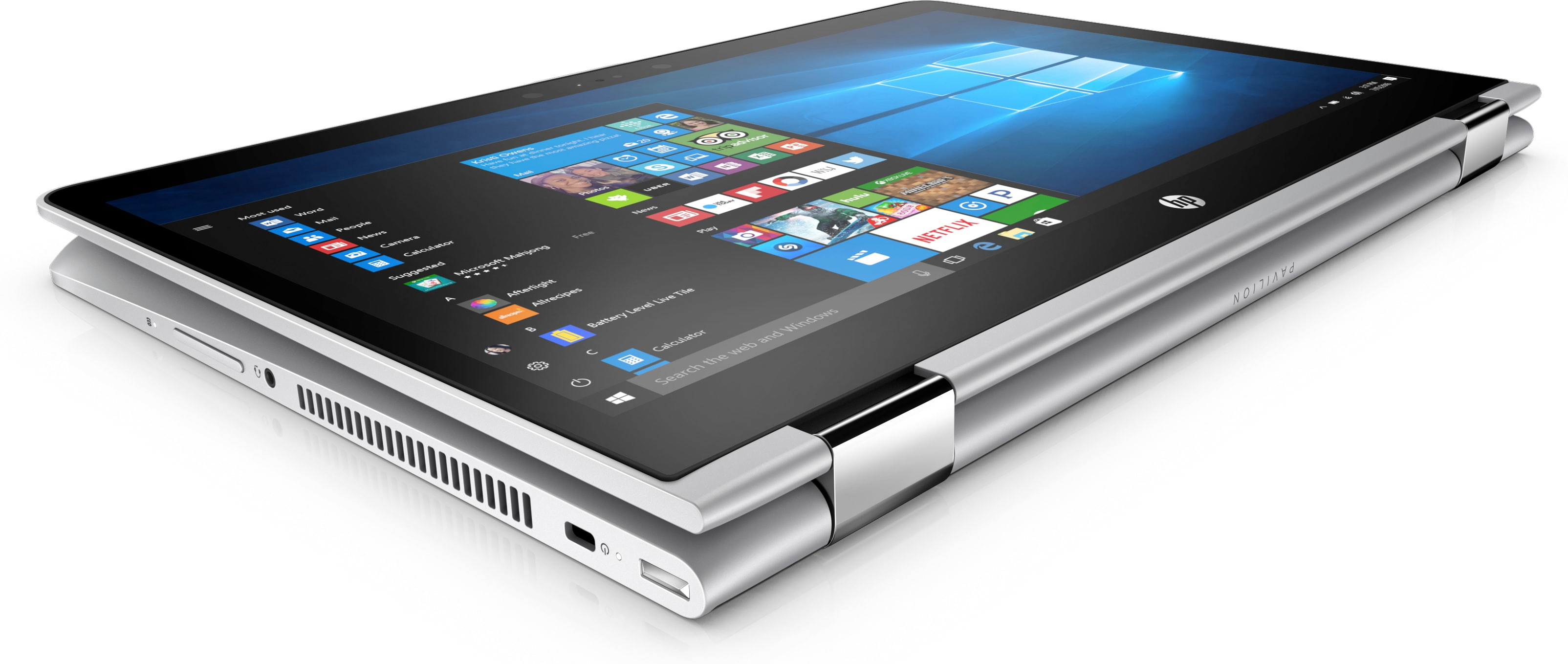 Ein silbernes HP Convertible-Notebook im Tablet-Modus mit Windows-Startmenü auf dem Bildschirm.