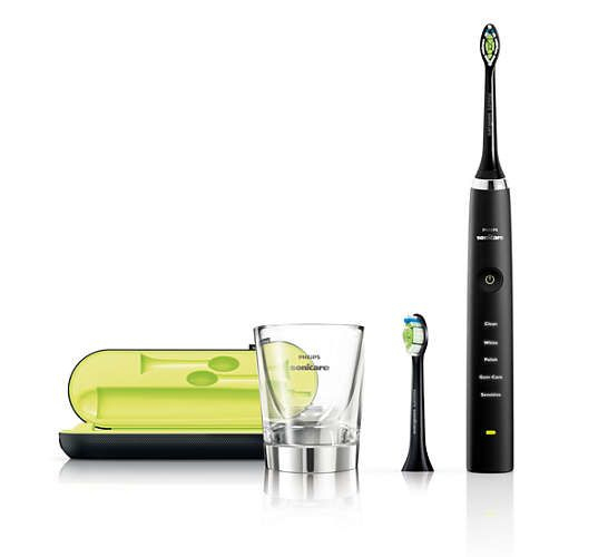 Philips Sonicare Zahnbürstenset. Schwarze Zahnbürste, Glas, Reiseetui und ein weiterer Bürstenkopf.