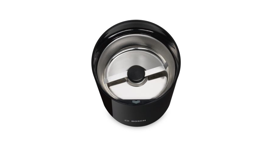 Vista superior de un molinillo de café Bosch negro con una cuchilla de acero inoxidable.
