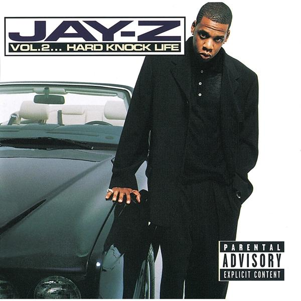 Jay-Z album borító. Jay-Z fekete öltönyben egy fekete autónak dől. Szülői felügyelet.