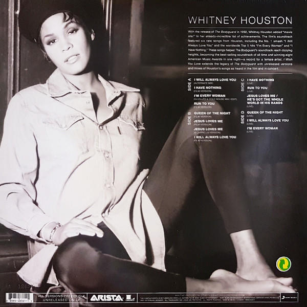Whitney Houston Albumcover. Sie sitzt mit verschränkten Beinen und trägt ein Hemd. Trackliste sichtbar.