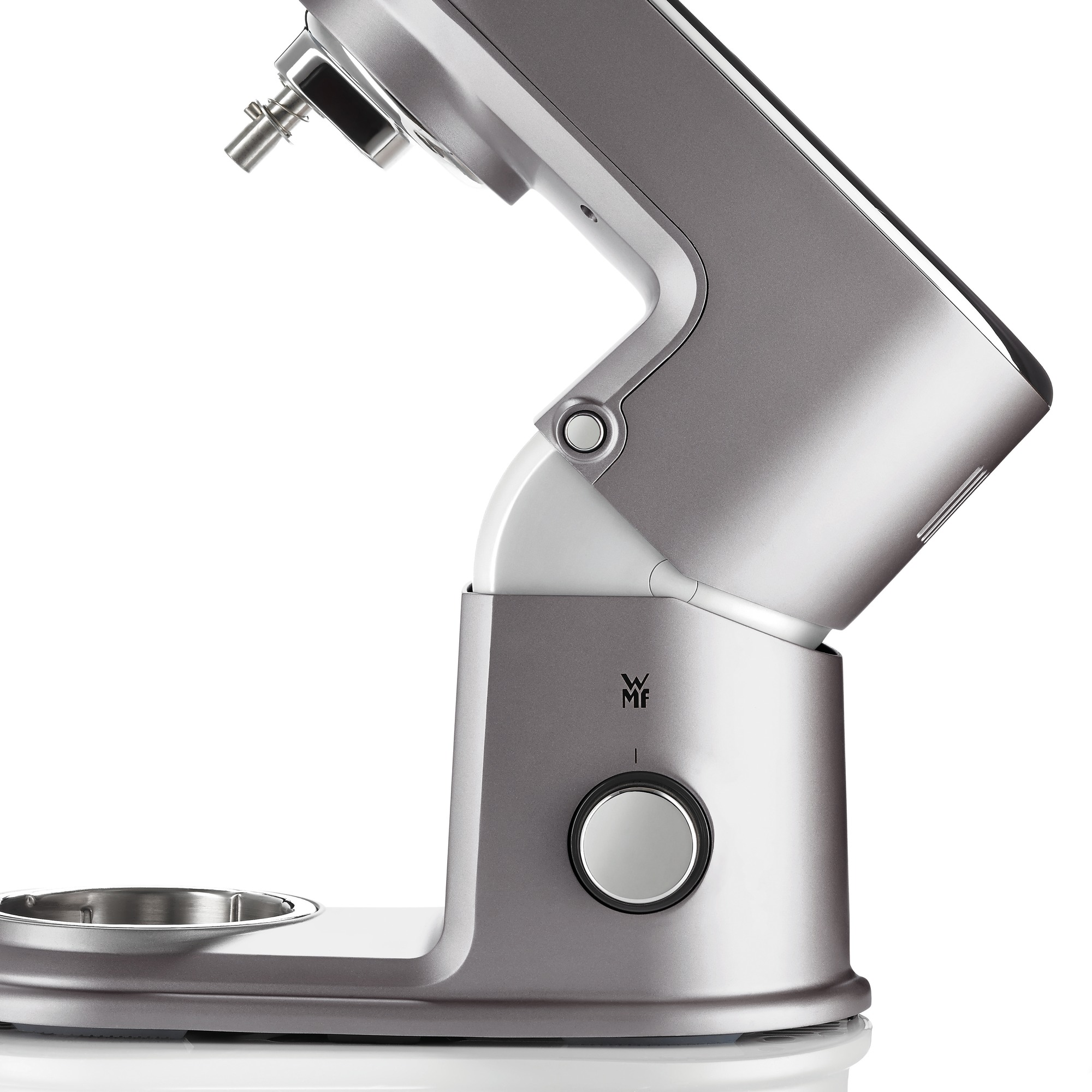 Silver kitchen mixer from a side view, showing the design and controls.