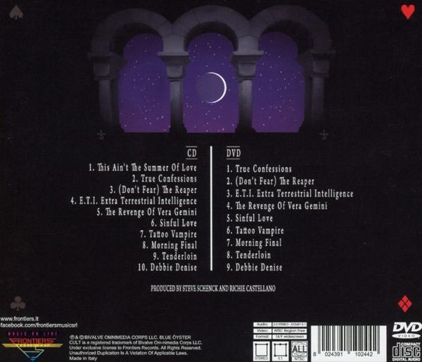 Jaquette arrière CD/DVD avec titres de chansons, lune en croissant blanche sur fond violet.