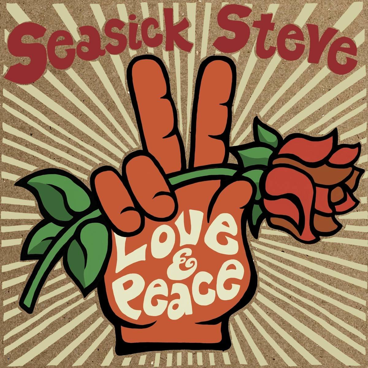 Main tenant une rose, signe de paix. Le texte dit 'Seasick Steve' et 'Love & Peace'.