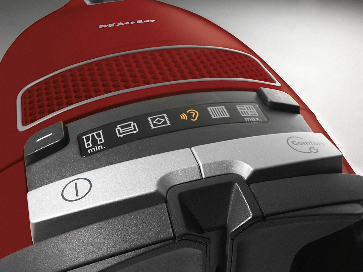 Rotes Miele Staubsauger-Bedienfeld. Zeigt Knöpfe und Symbole. Grau und rot.