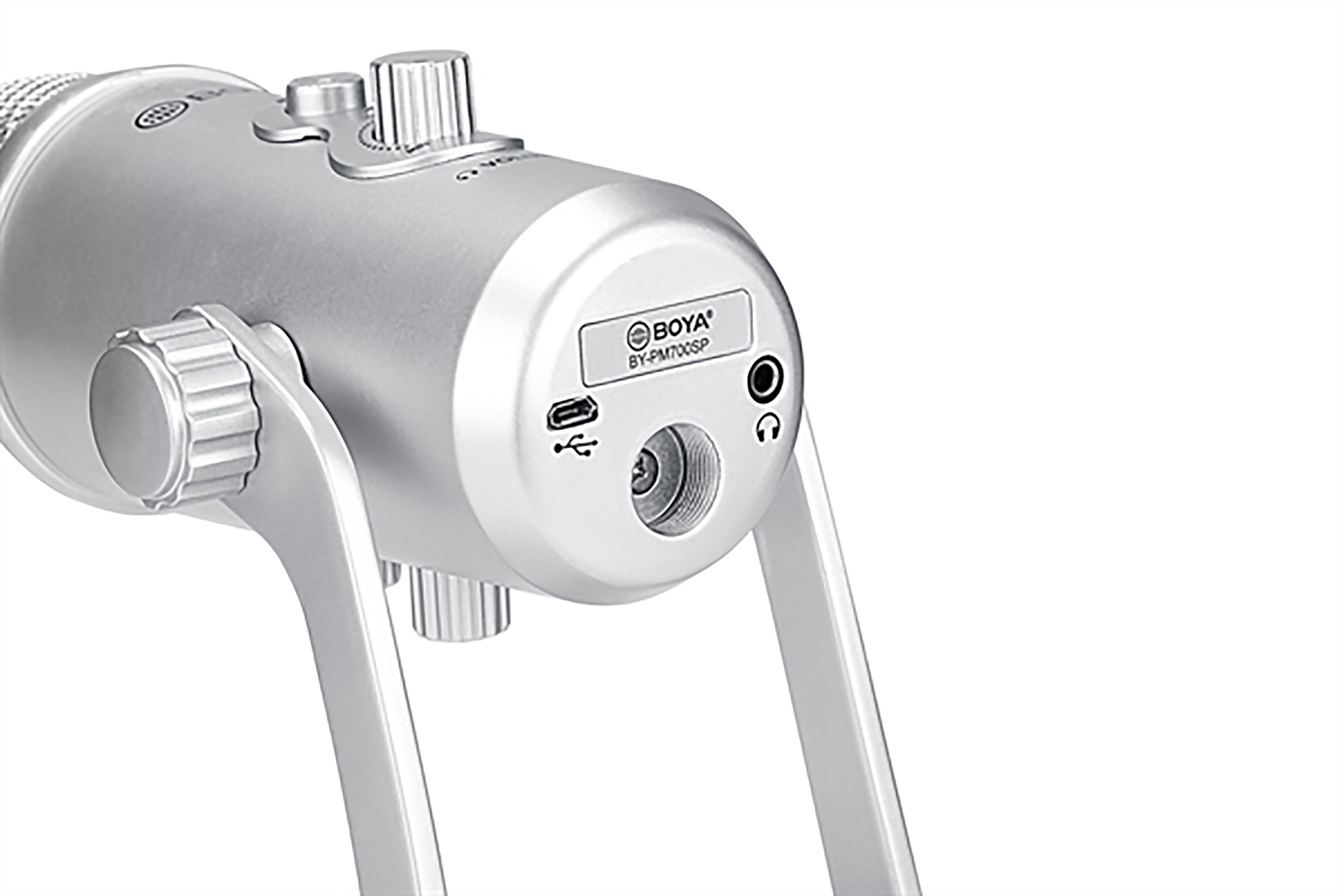 Close-up of a silver microphone's base. It has USB, headphone jack, and adjustment knobs.