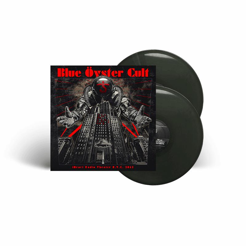 Blue Oyster Cult Albumcover mit einer Weltraumfigur über einer Stadt. Schwarze Schallplatten.