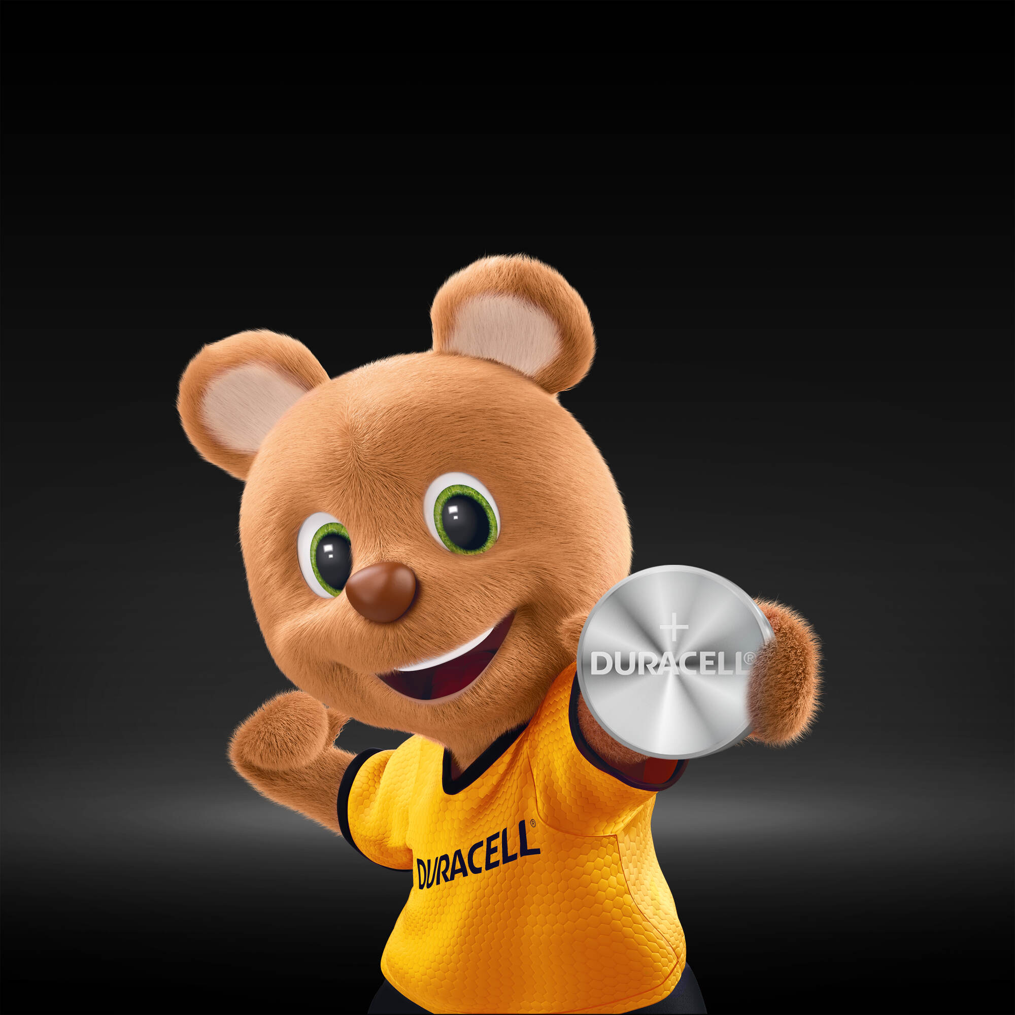 Çizgi film ayısı gümüş bir Duracell pili tutuyor.