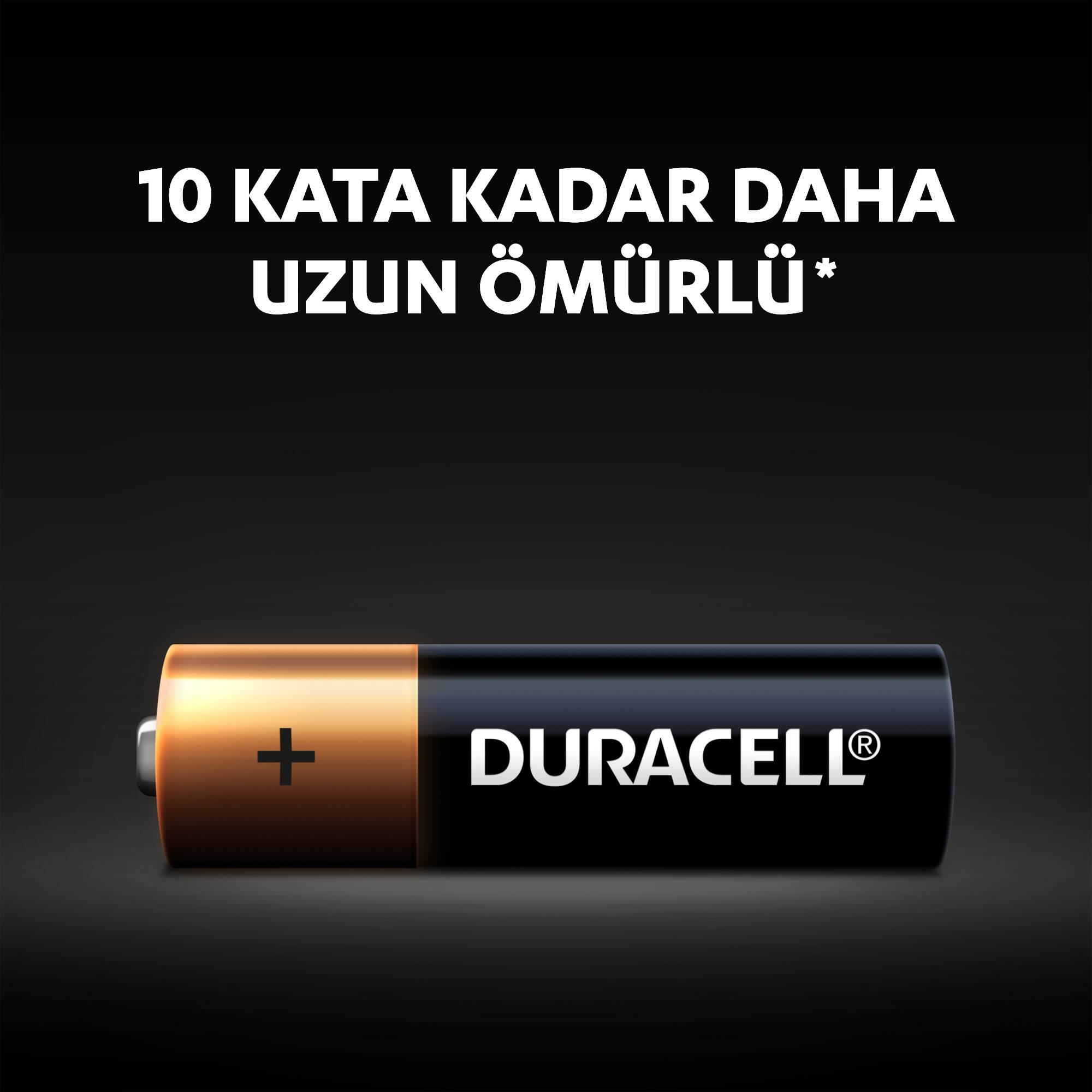 Duracell logosu ve Türkçe metin içeren siyah ve altın rengi Duracell AA pil: