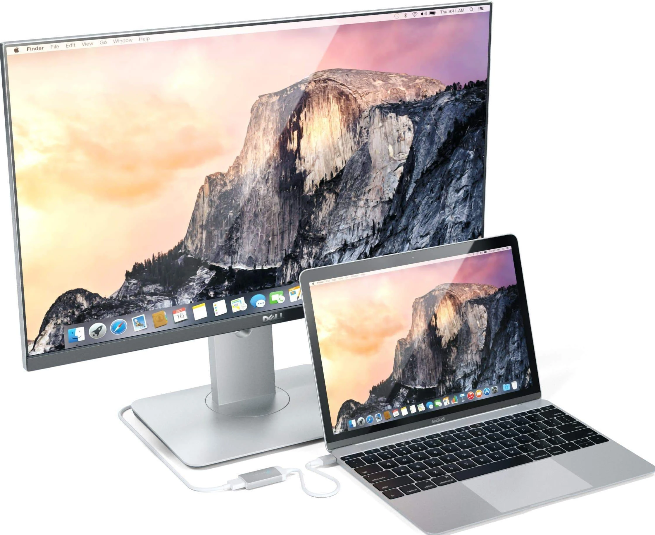 Laptop- und Monitor-Setup, Anzeige mit Berglandschaft, verbunden durch ein Kabel.