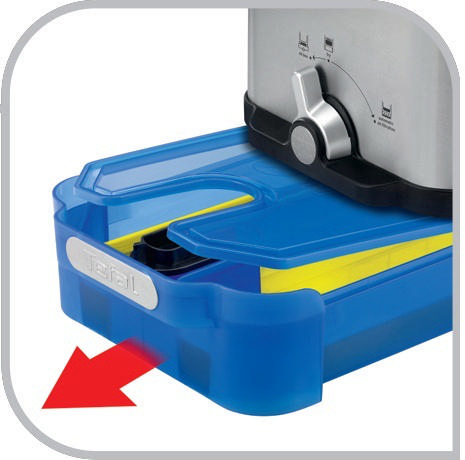 Nahaufnahme eines blauen Tabletts mit einem blau-gelben Fach. Ein roter Pfeil zeigt an.