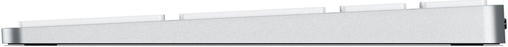 Seitenansicht einer weißen Tastatur.