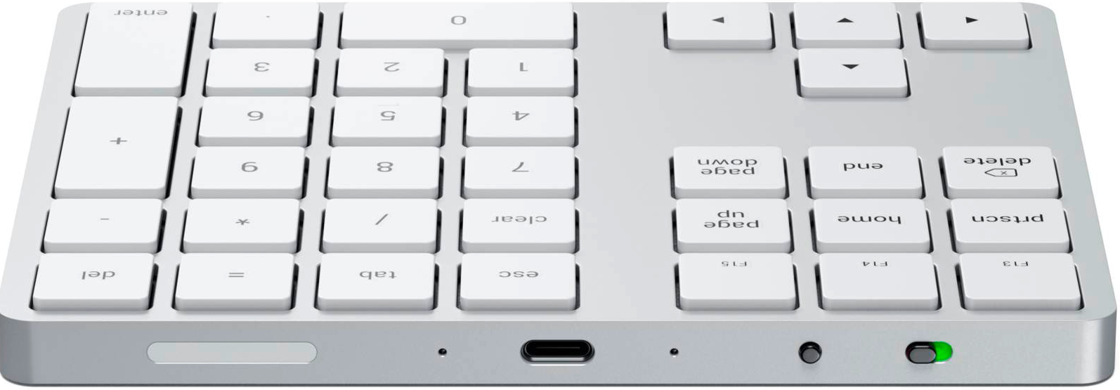 Nahaufnahme einer weißen Tastatur mit silbernem Rahmen. Tasten umfassen Zahlen, Symbole und Funktionstasten. Ein USB-C-Anschluss befindet sich unten.